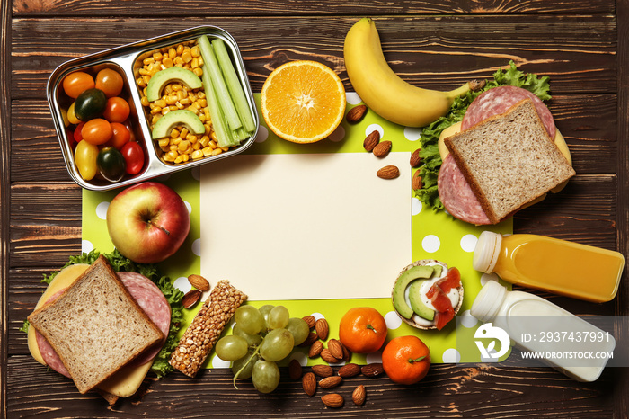 Frame made of tasty healthy food for kid on wooden background