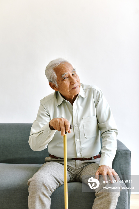 Confusing and forgetful elderly asian man with thinking gesture, Alzheimers disease, Dementia cogni