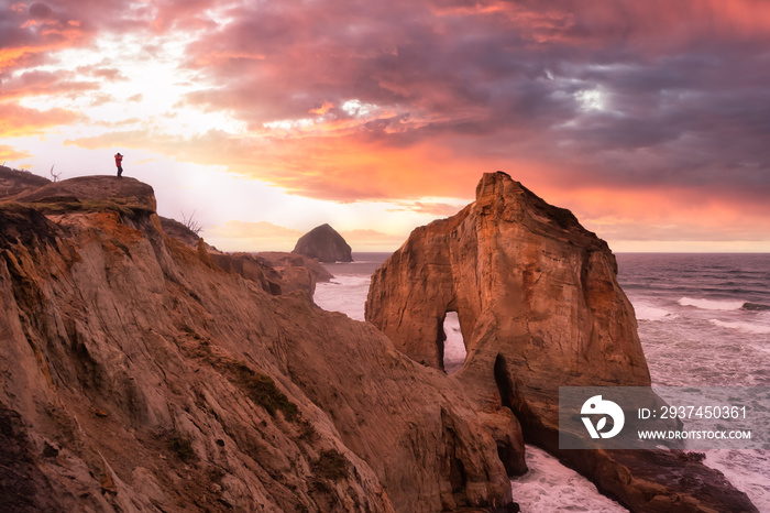 Photographer is taking pictures of the beautiful seaside view on the Oregon Coast. Taken in Cape Kiw