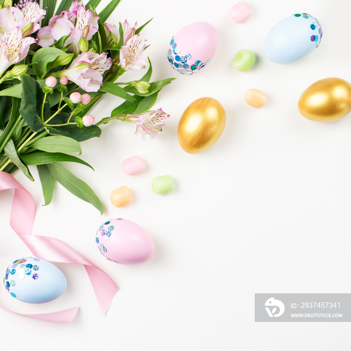 Festive Easter background with decorated eggs, flowers, candy and ribbons in pastel colors on white.