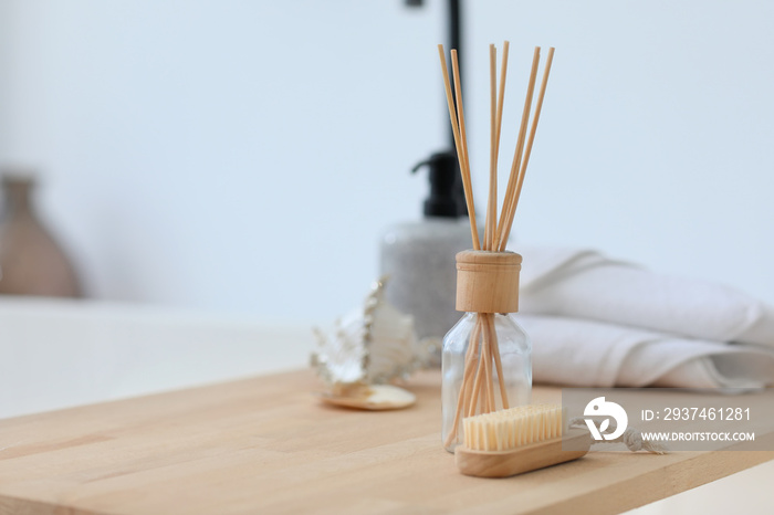 Bath accessories on wooden table