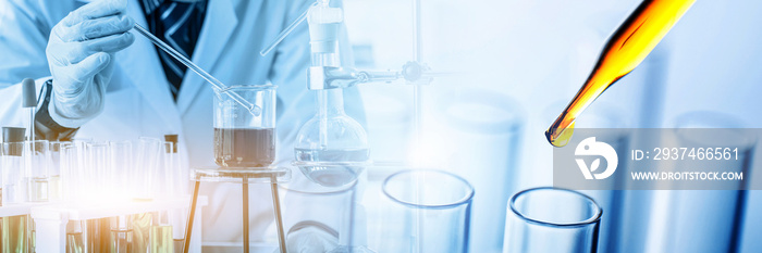 scientist holding flask with lab glassware and test tubes in chemical laboratory background, science