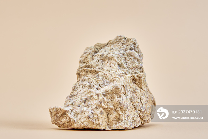 Natural granit stone on beige background, minimal product podium