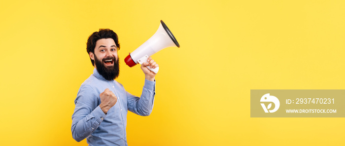 hipster man with megaphone over yellow background, success concept, panoramic mock-up