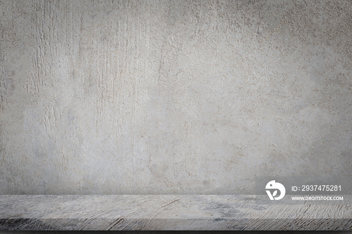 Concrete floor with empty grey concrete wall background.