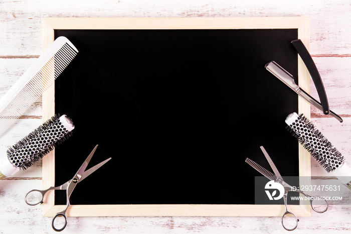 Blank blackboard and scissors hairdresser set with various acces
