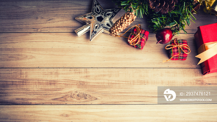 Christmas tree with decoration on wooden background