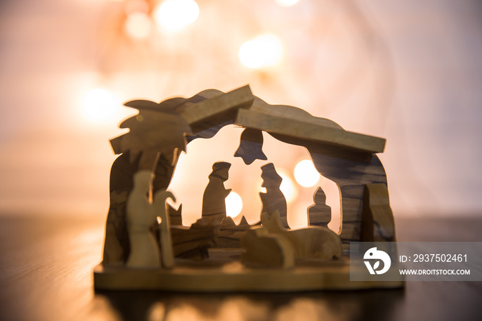 nativity scene on wooden background