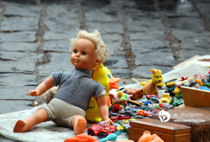 An old doll in the flea market