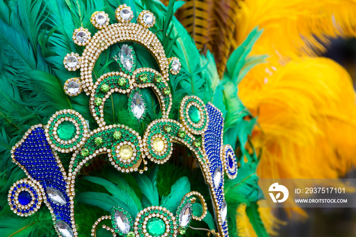 helmet decorated with bright stones and feathers for carnival