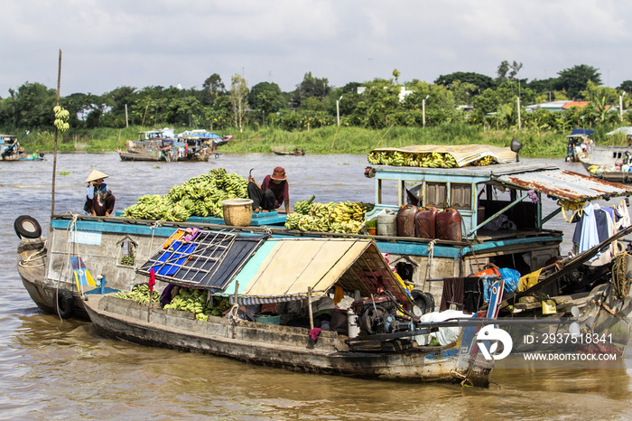 Floating market on the river in the Mekong Delta near the city of Chau Doc in Vietnam