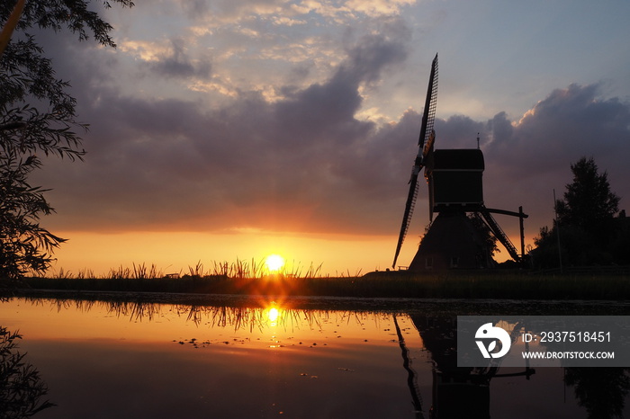 windmill at sunset, netherlands