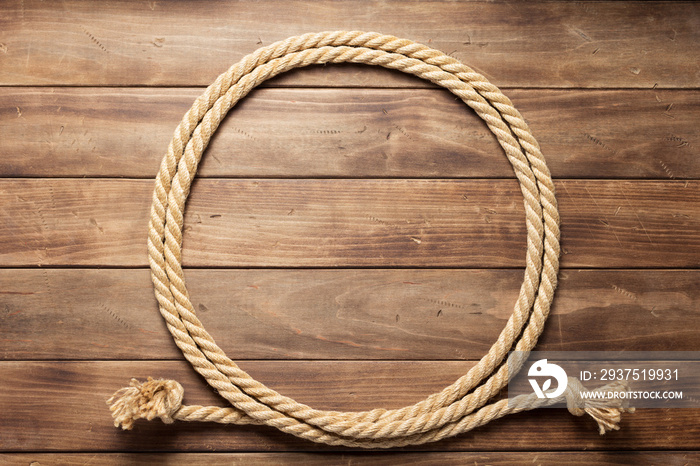 ship rope at wooden background texture