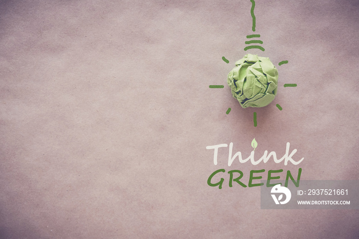 Green paper light bulb with Think Green, eco energy saving concept
