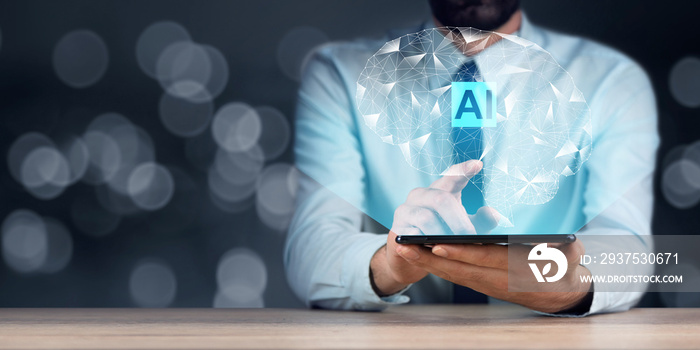 man holding tablet with AI icons