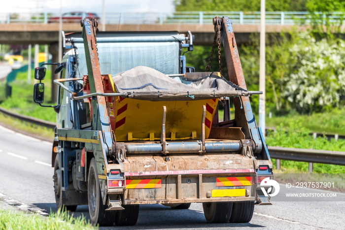 skip lorry truck on uk motorway in fast motion