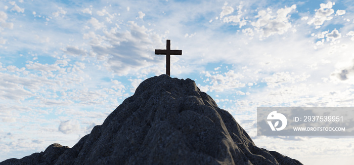 Cross on mountain peak at sunset christian religion