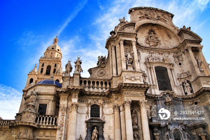 Tower bell, sculptures and carved stone details of the Cathedral of Murcia