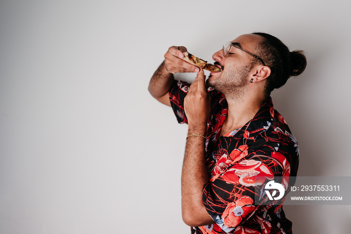 male model eating chocolate pizza