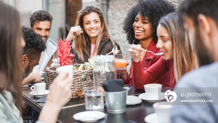 Group of happy friends drinking coffee and cappuccino at vintage bar outdoor - Young millennials peo