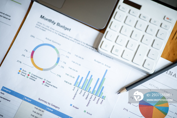 The Financial accounting calculate concept with calculator graphs and charts