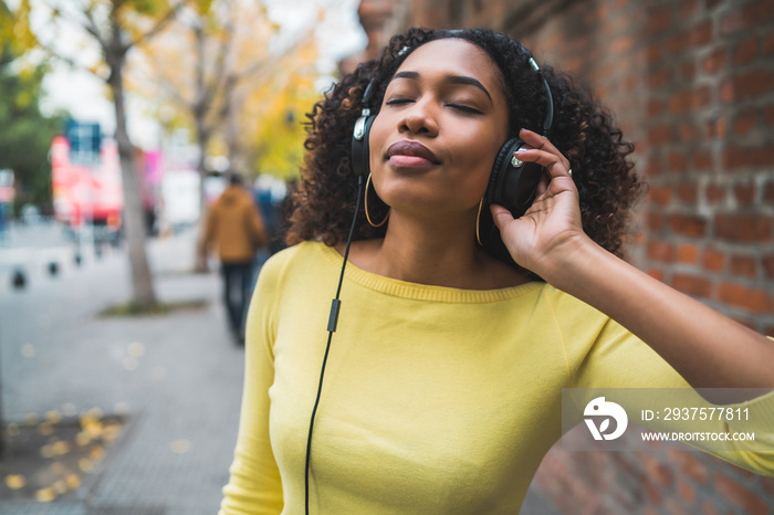 Afro american woman listening music