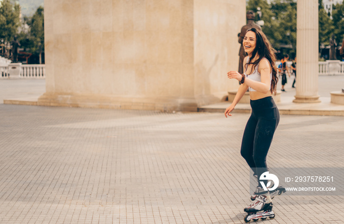 Girl roller skating in summer