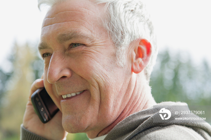 Close-up of middle-aged man on cell phone