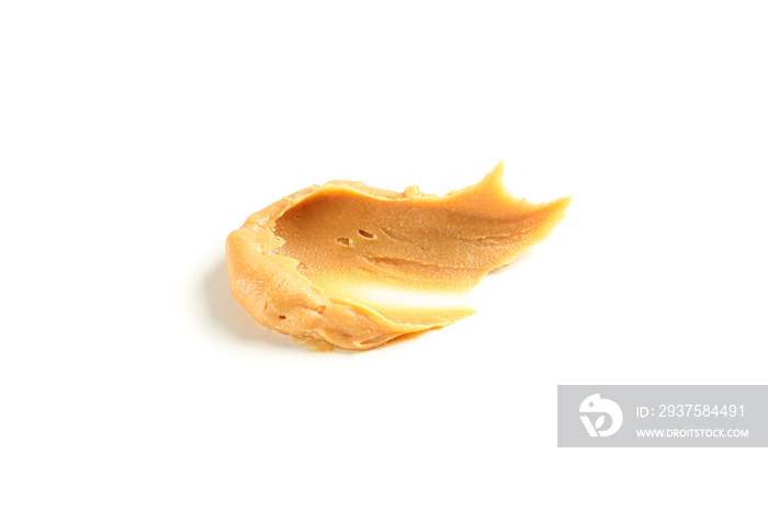 Creamy peanut butter isolated on white background. A traditional product of American cuisine