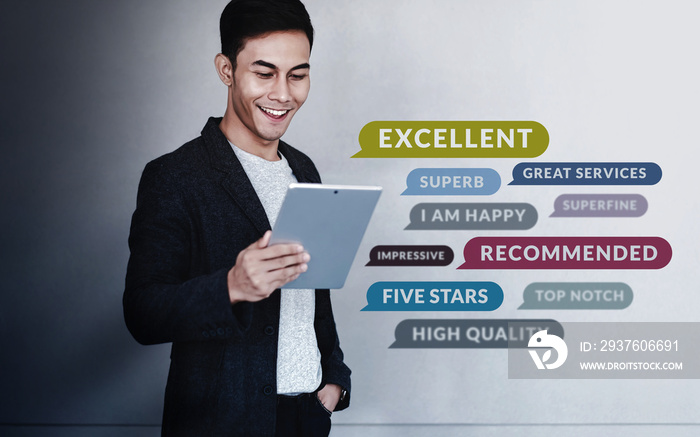 Customer Experiences Concept. a Young Happy Man Reading Positive Review Rating via Digital Tablet. C