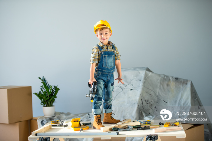 Little boy with tools