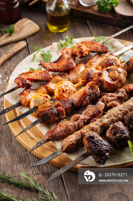 Assorted caucasian shashlyq skewers and kebabs