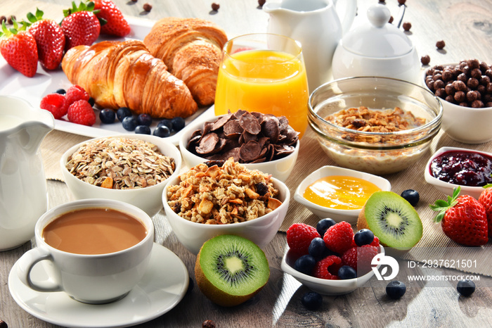 Breakfast served with coffee, juice, croissants and fruits