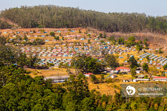 Panoramic view of typical village with colorful houses arranged in geometric manner, Swaziland, Sout