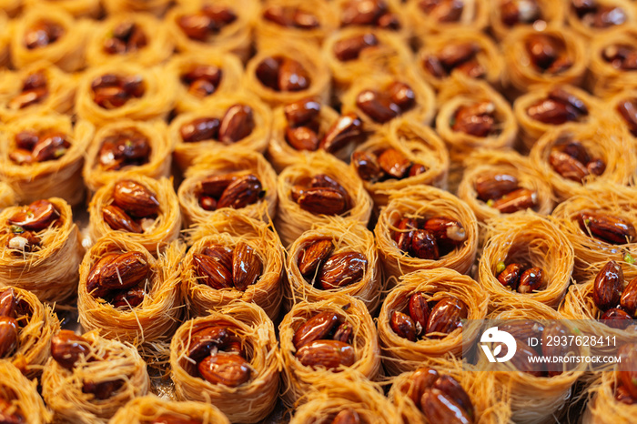 Traditional arabic sweets (dessert kadaif, kunafa, baklava) in the Jerusalem market, Israel.