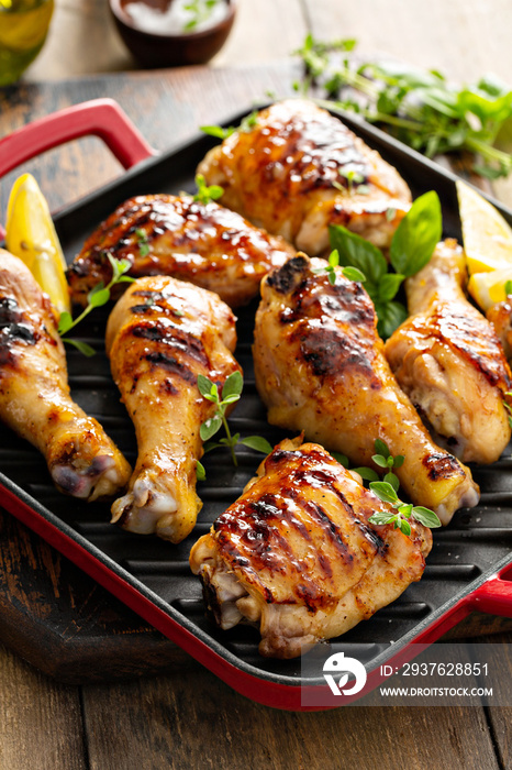 Grilled chicken thighs and drumsticks with honey glaze