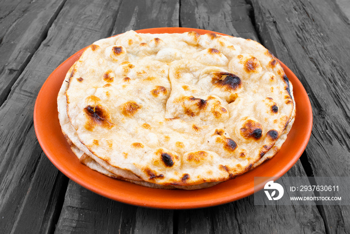 Indian Cuisine - Tandoori Roti whole wheat flat bread made from stoneground wholemeal flour, Traditi