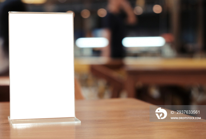 Menu frame standing on wood table in Bar restaurant cafe. space for text marketing promotion.