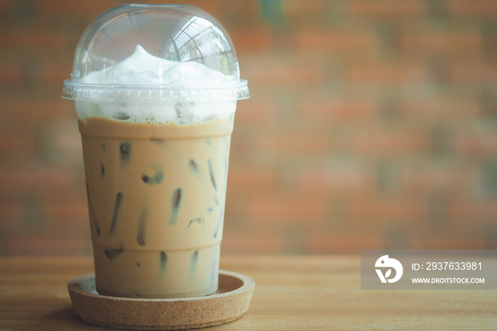 Iced Mocha coffee and milk cream in takeaway clear plastic cup