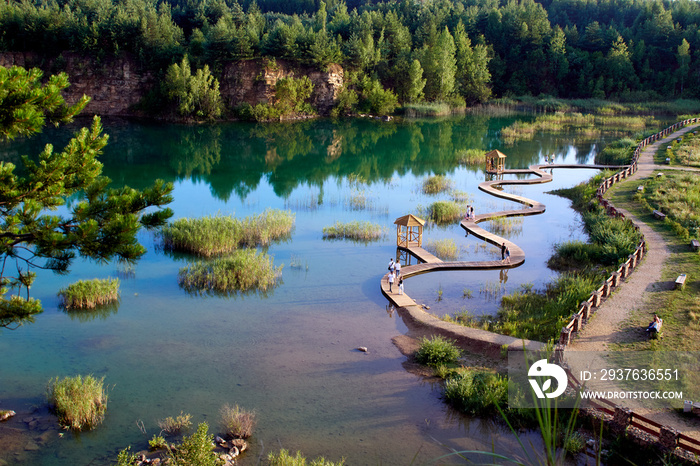 Park in Jaworzno. Old quarries flooded with water.