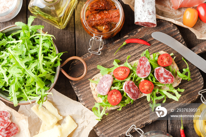 Italian food on wooden background