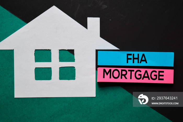 FHA Mortgage text on sticky notes. Office desk background.