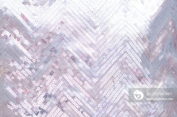 Fabric texture with shimmering silver sequins.