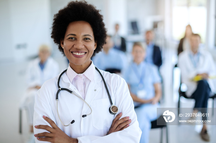 Happy African American female doctor on a healthcare seminar.