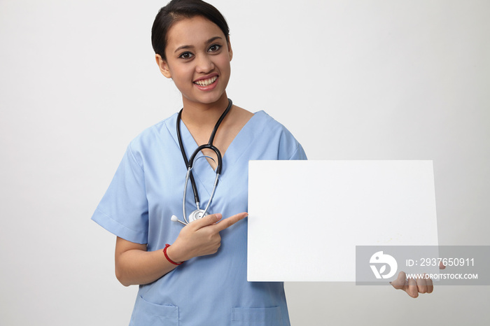 nurse holding placard