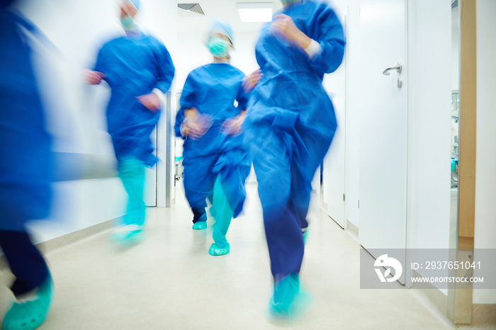 Running doctors going to help a patient