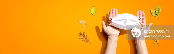 Facial mask with autumn leaves