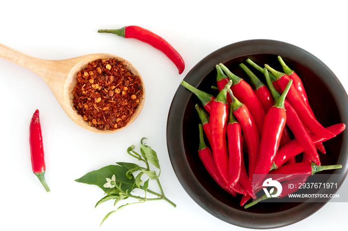 fresh red chilli pepper and crushed dried red cayenne pepper with a seeds , rich of antioxidant herb