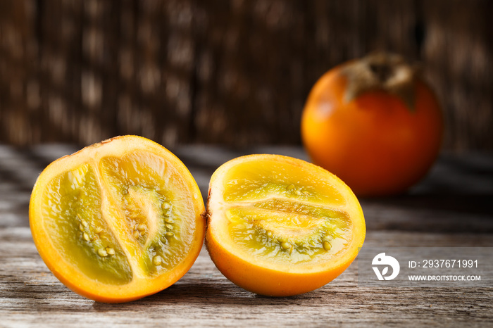 Fruit of lulo or naranjilla on wood