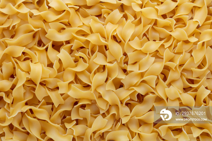 Raw pasta isolated on white background.